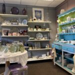 Cold Bath Road charity shop shelves with homeware
