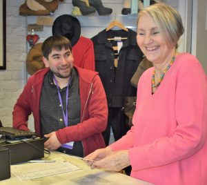 Manager Matt having a laugh with volunteer Mel