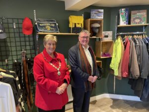 Tony Collins and Pauline Phillips browse Saint Michael's donations